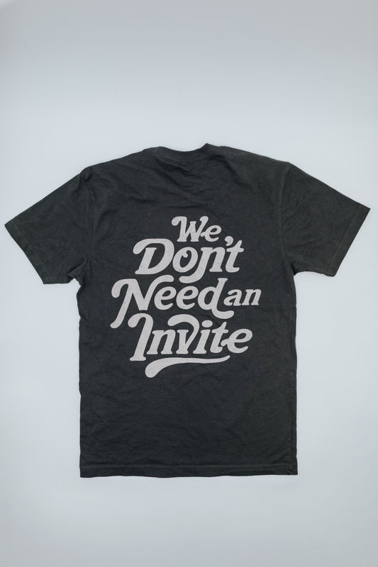 Black t-shirt with white text on a light gray background